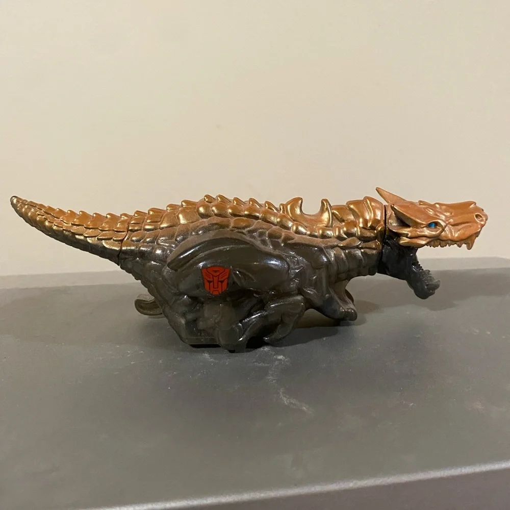 Transformers Autobot Dinosaur Action Figure
